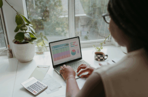 Making Tax Easy. A lady looking at her tax on a laptop